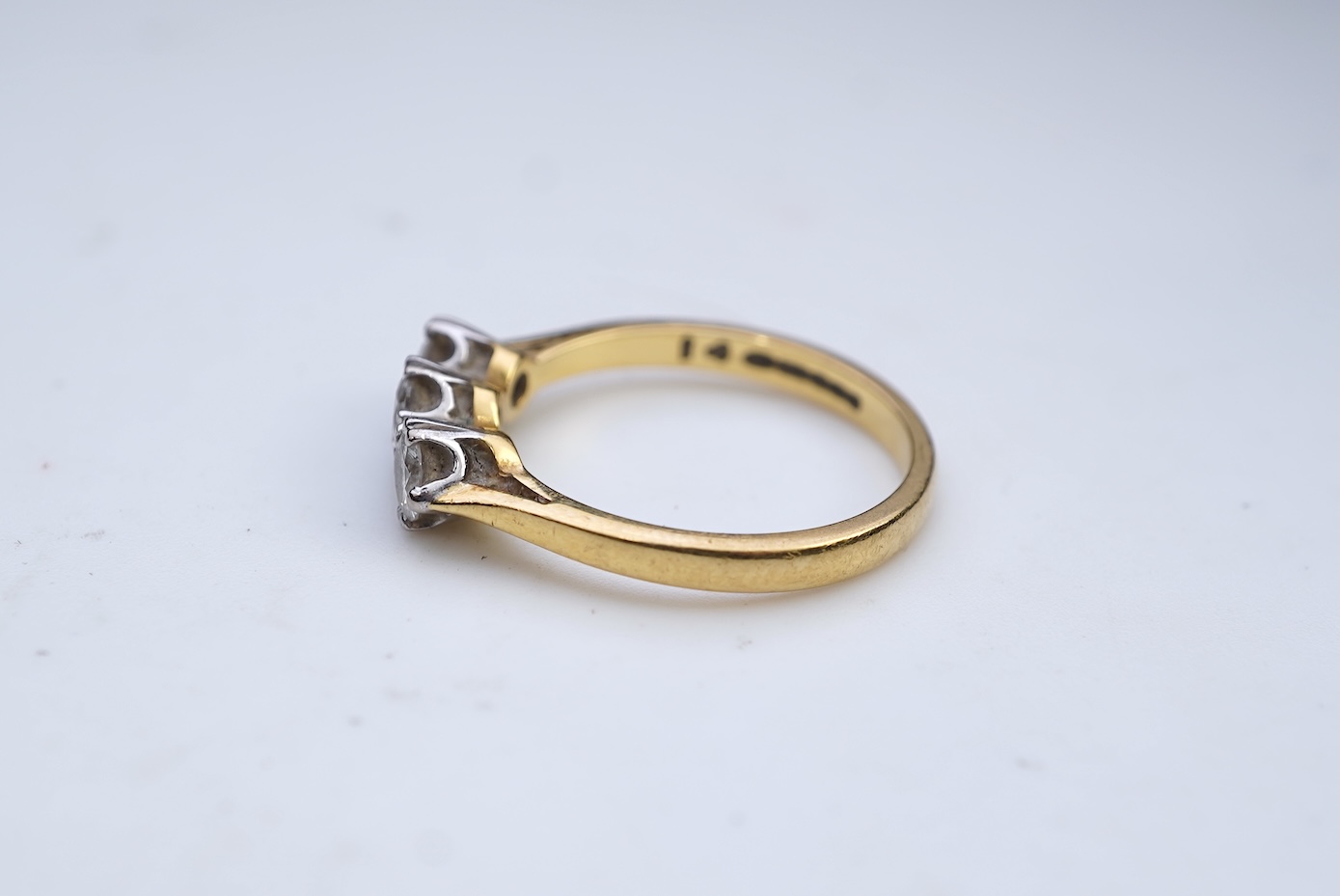 A three-stone diamond ring